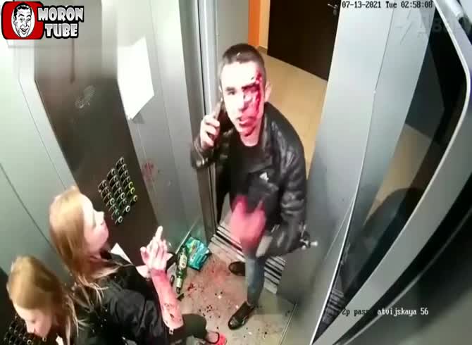 Video :A dysfunctional couple was caught on camera assaulting one another in an elevator